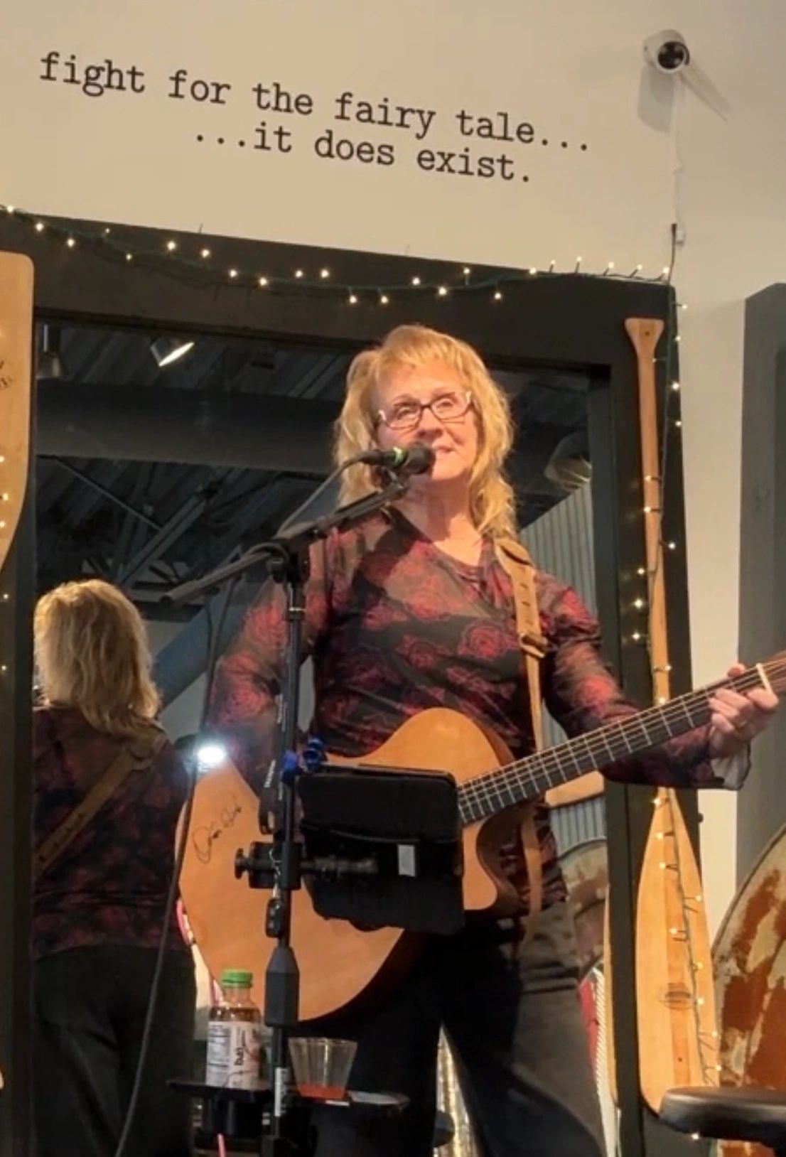 Kate performing at Rue Boutique